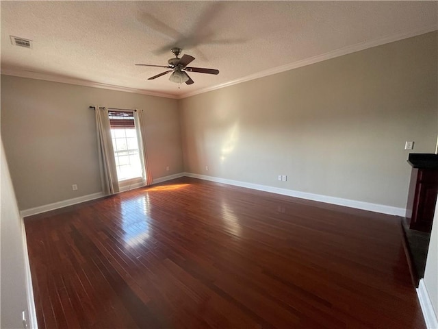 unfurnished room with crown molding, dark wood-type flooring, a textured ceiling, and ceiling fan