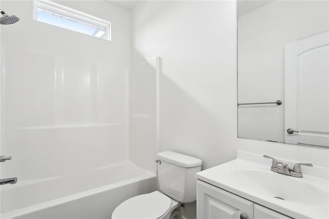 full bathroom with shower / bathtub combination, vanity, and toilet