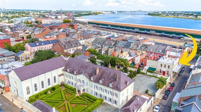 birds eye view of property featuring a water view