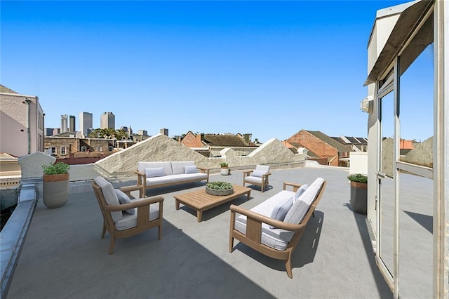 view of patio / terrace with outdoor lounge area and exterior kitchen