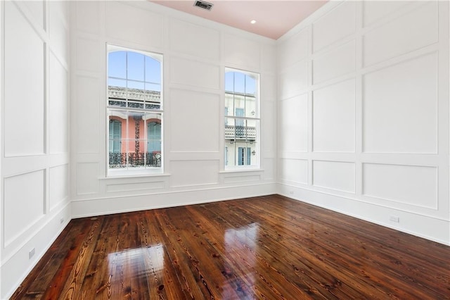 unfurnished room featuring dark hardwood / wood-style floors