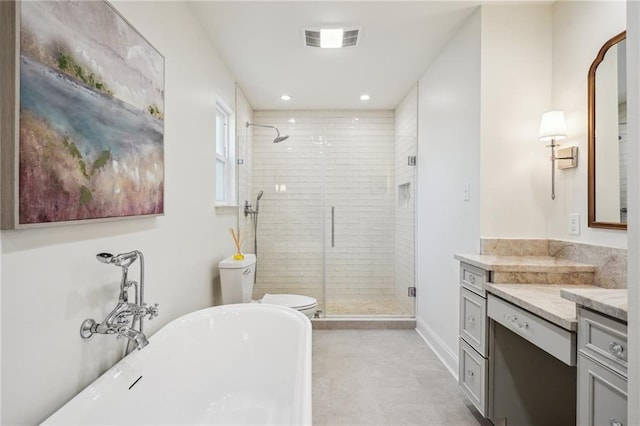 bathroom featuring vanity and shower with separate bathtub