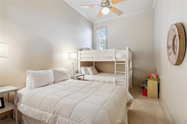 bedroom featuring crown molding, light colored carpet, and ceiling fan