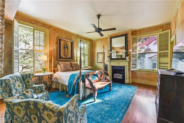 bedroom with dark hardwood / wood-style flooring