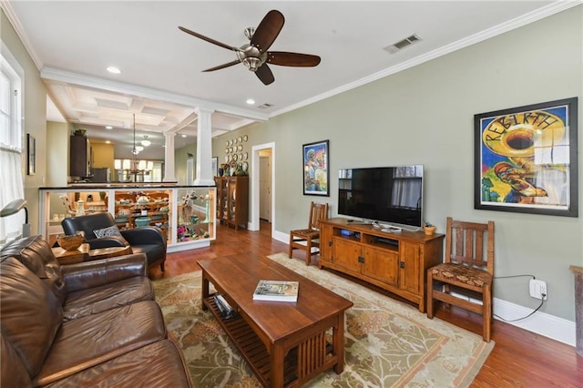 living room with ornamental molding, wood-type flooring, coffered ceiling, and decorative columns