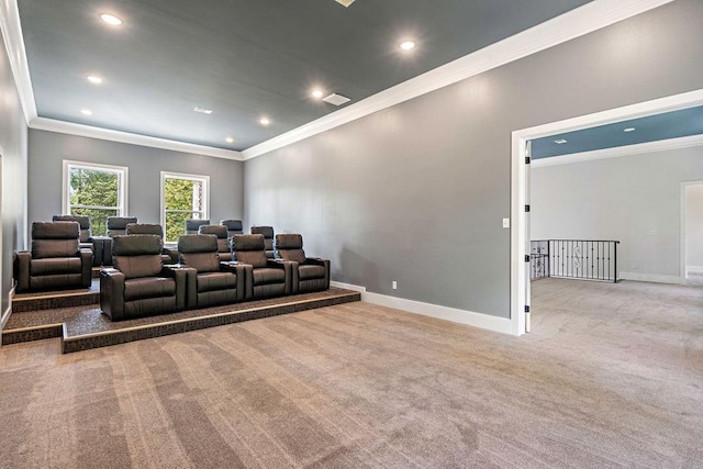 carpeted cinema room with crown molding