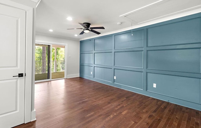 unfurnished room featuring dark hardwood / wood-style flooring, ornamental molding, and ceiling fan