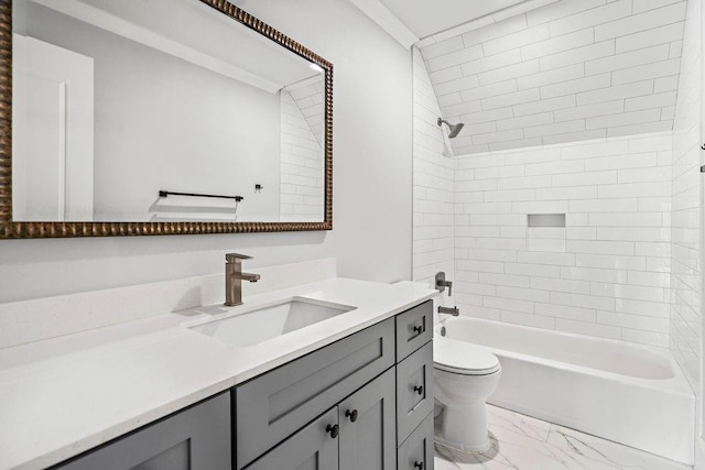 full bathroom featuring vanity, toilet, and tiled shower / bath combo