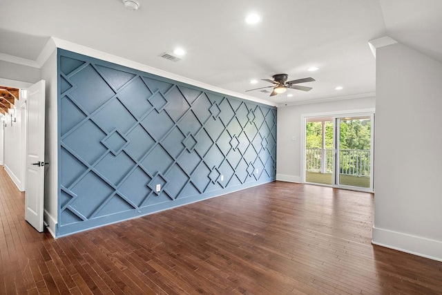 spare room featuring crown molding, ceiling fan, and dark hardwood / wood-style flooring