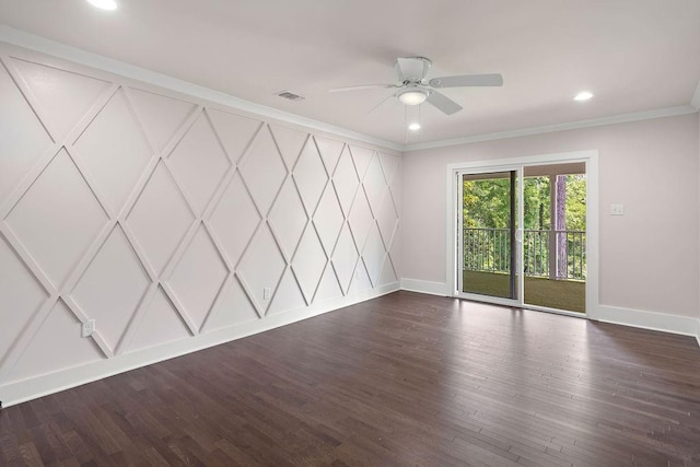 spare room featuring crown molding, ceiling fan, and dark hardwood / wood-style floors