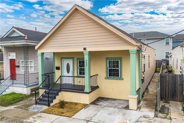 bungalow-style home with covered porch