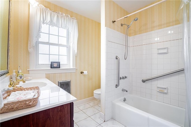 1201 Moss Ln, River Ridge, LA 70123 - full bathroom featuring tiled shower / bath, vanity, and toilet