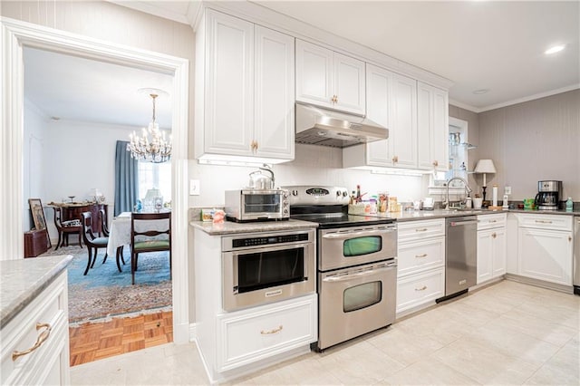 1201 Moss Ln, River Ridge, LA 70123 - kitchen with white cabinetry, sink, a chandelier, stainless steel appliances, and crown molding