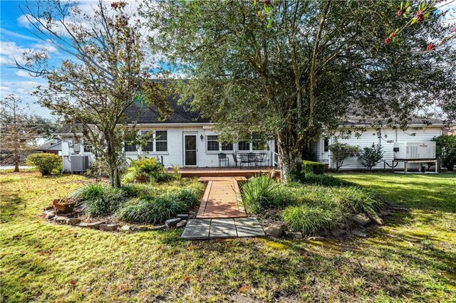 1201 Moss Ln, River Ridge, LA 70123 - back of house with a wooden deck and a lawn