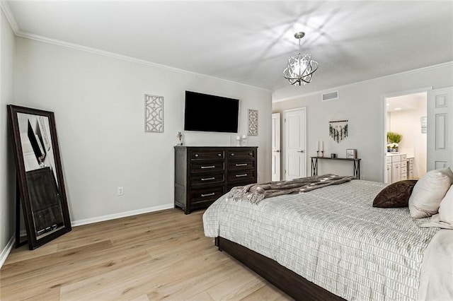 bedroom with crown molding, a chandelier, and light hardwood / wood-style floors