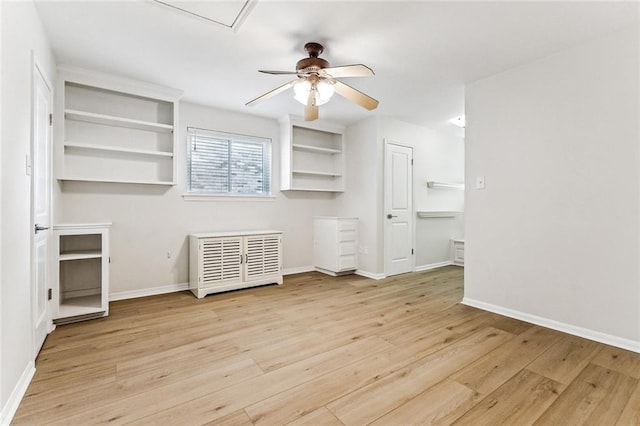 interior space with ceiling fan and light hardwood / wood-style floors