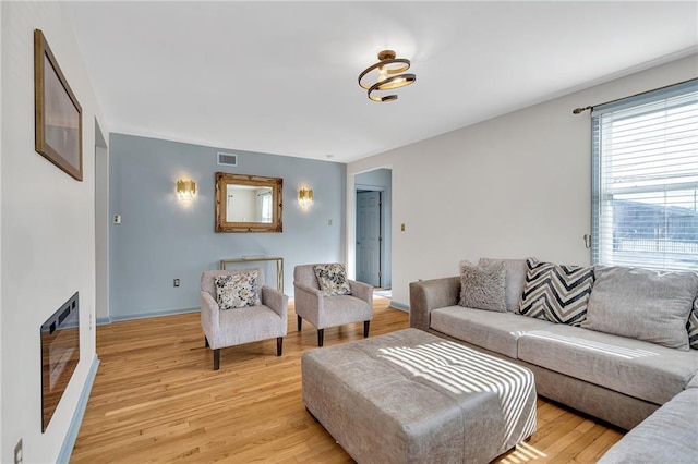 living room featuring light wood-type flooring