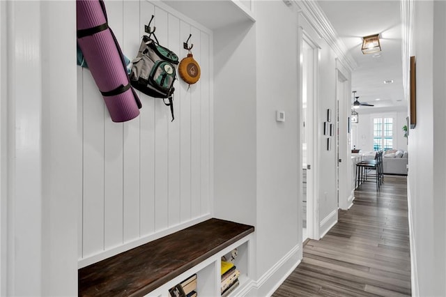 mudroom with wood-type flooring