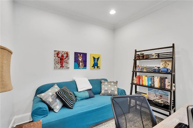 sitting room featuring crown molding