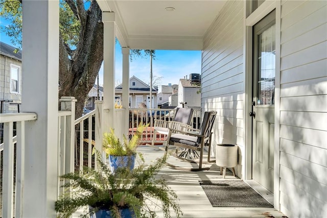 balcony featuring a porch