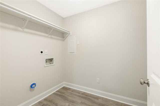 laundry area with hardwood / wood-style flooring, washer hookup, and hookup for an electric dryer