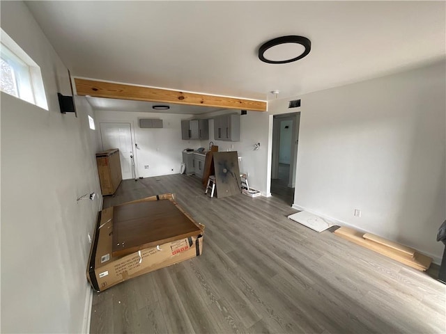 unfurnished living room with hardwood / wood-style flooring