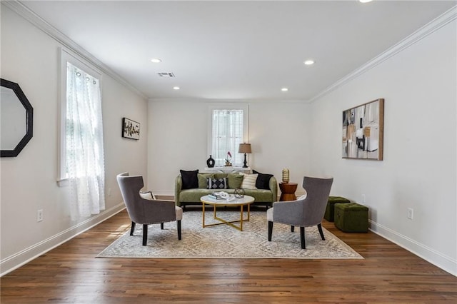 living room featuring dark wood-type flooring and crown molding