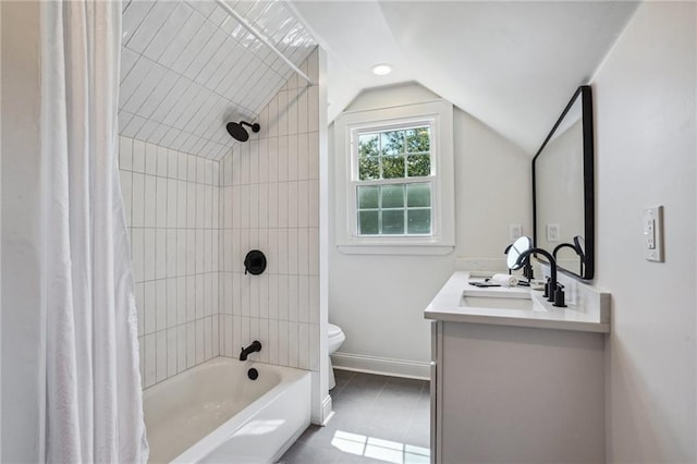 full bathroom featuring lofted ceiling, shower / bathtub combination with curtain, vanity, tile patterned floors, and toilet