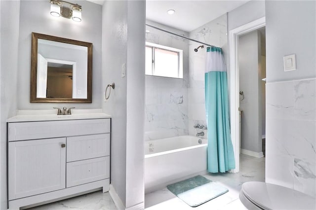 full bathroom featuring shower / tub combo with curtain, vanity, and toilet