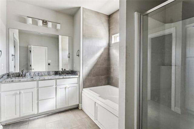 bathroom with independent shower and bath and vanity