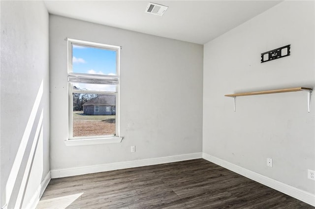 empty room featuring wood-type flooring