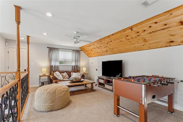 game room with lofted ceiling, ceiling fan, carpet flooring, and visible vents