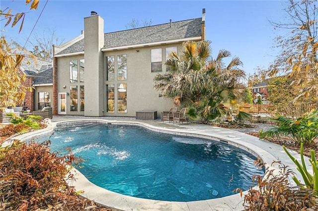 pool featuring a patio area