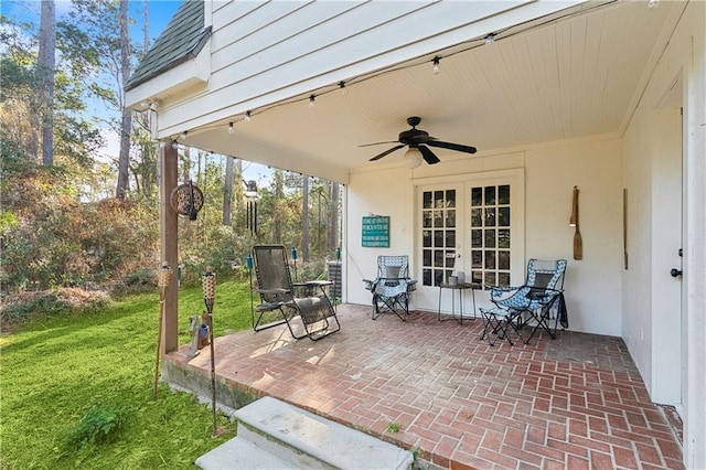 view of patio featuring ceiling fan and french doors