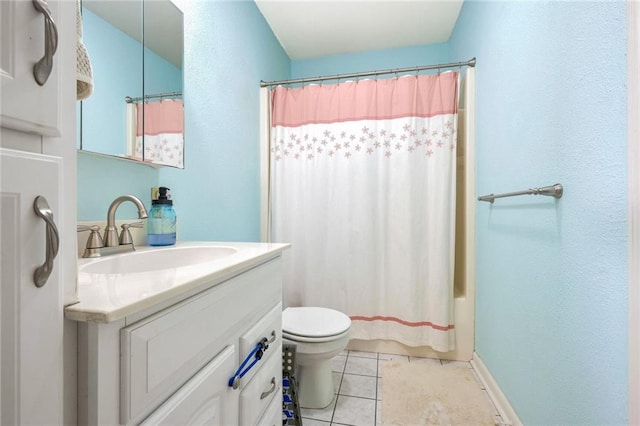 full bathroom featuring vanity, tile patterned floors, toilet, and shower / bathtub combination with curtain