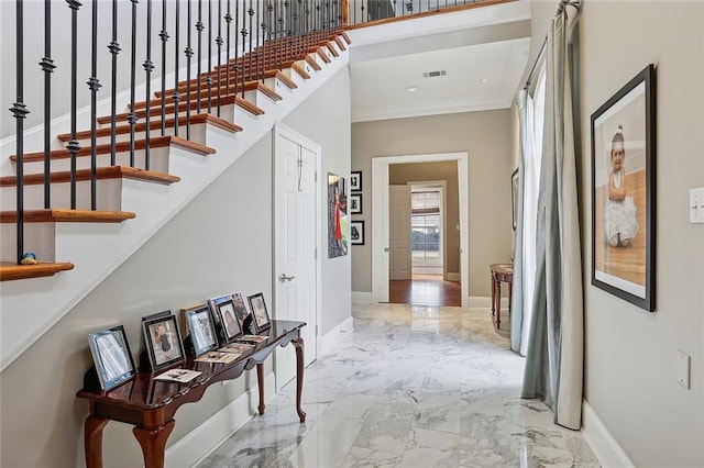 7 Bluebird St, New Orleans, LA 70124 - corridor featuring crown molding, marble finish flooring, stairs, and recessed lighting