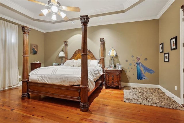 7 Bluebird St, New Orleans, LA 70124 - bedroom featuring a tray ceiling, wood-type flooring, ornamental molding, recessed lighting, and ceiling fan