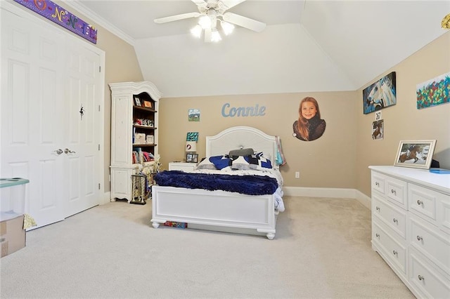 bedroom featuring ceiling fan, light colored carpet, and lofted ceiling