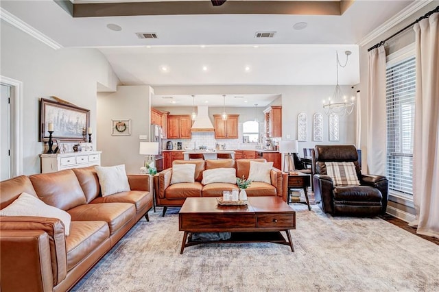 living room with a notable chandelier