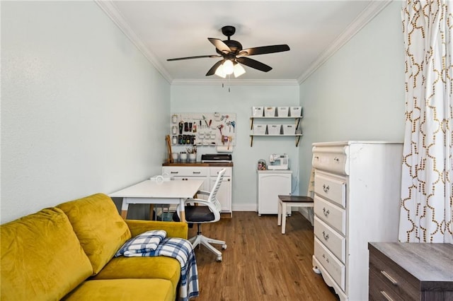 office featuring ornamental molding, hardwood / wood-style floors, and ceiling fan