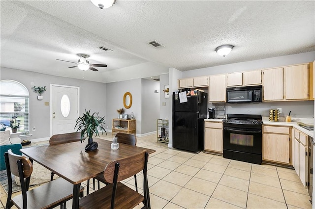 kitchen with ceiling fan, light brown cabinets, light tile patterned floors, and black appliances