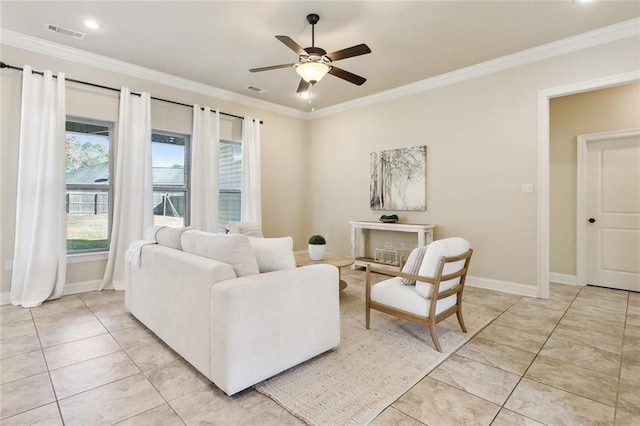 tiled living room with ceiling fan and ornamental molding