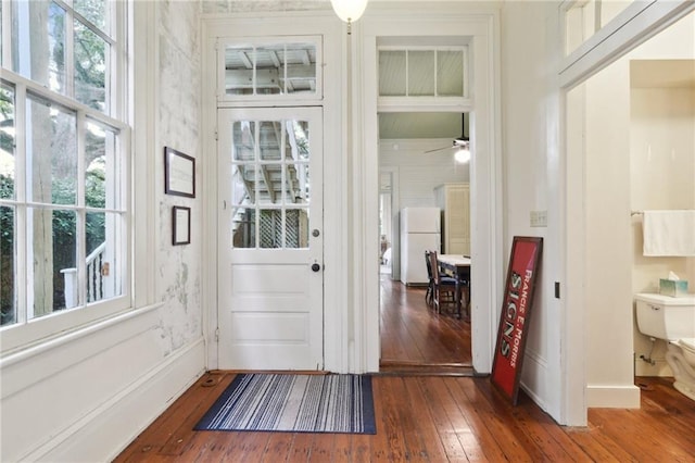 doorway featuring dark wood-type flooring