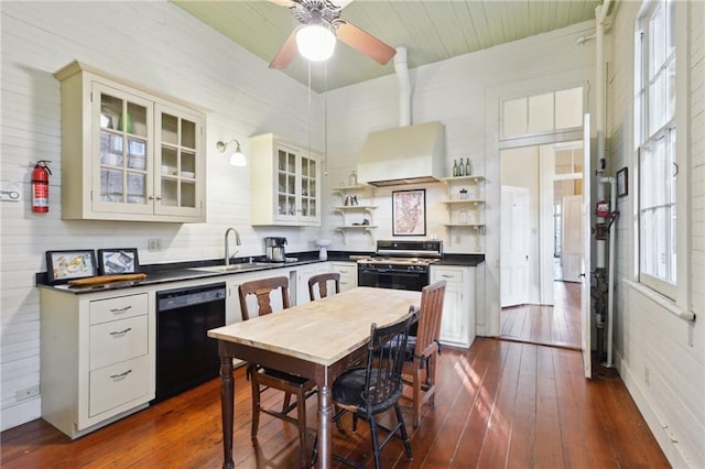 kitchen with sink, dark hardwood / wood-style floors, black dishwasher, white cabinets, and range with gas cooktop