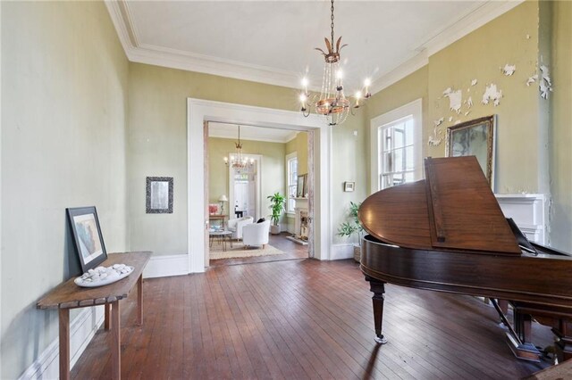 172224 Delachaise St, New Orleans, LA 70115 - sitting room featuring a chandelier, crown molding, hardwood / wood-style floors, and baseboards