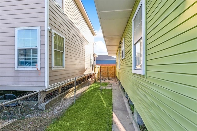 view of home's exterior featuring a yard