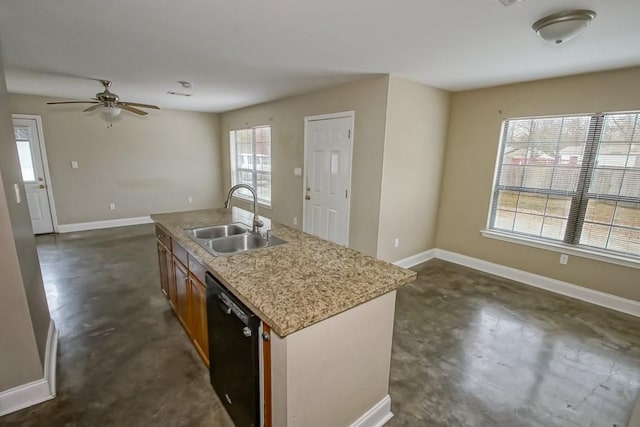 kitchen with dishwasher, an island with sink, sink, and ceiling fan