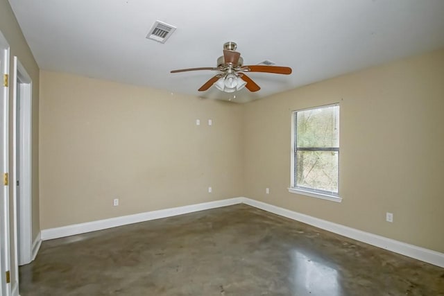 spare room with ceiling fan