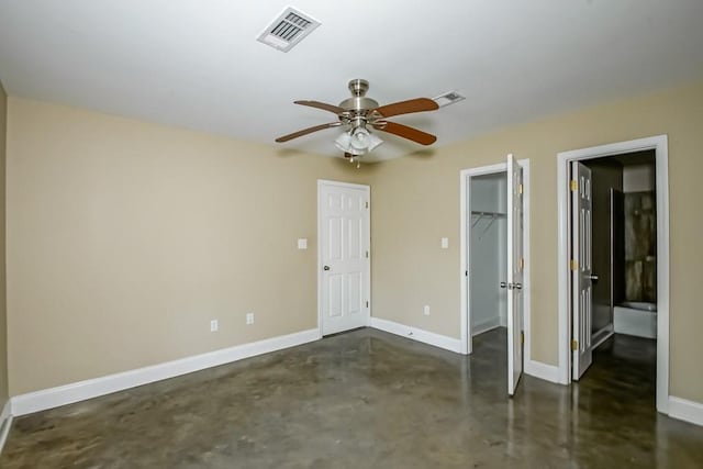 unfurnished room with ceiling fan