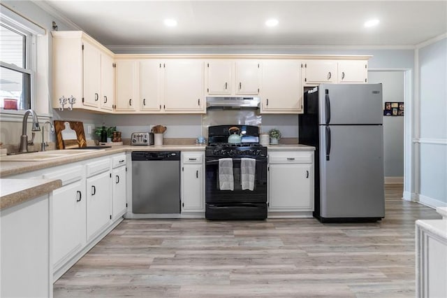 9028 Camille Ave, River Ridge, LA 70123 - kitchen featuring a sink, light countertops, under cabinet range hood, appliances with stainless steel finishes, and crown molding
